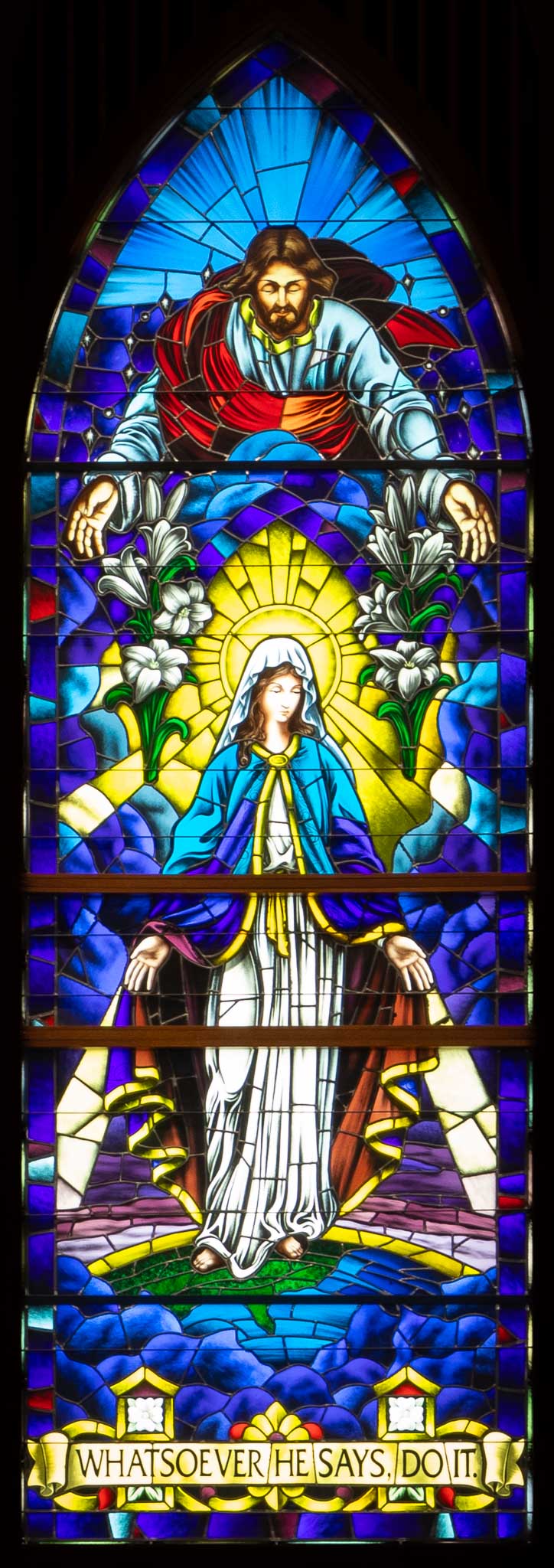 Stained glass window of Jesus and St. Mary.